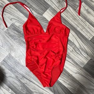 Red open back once piece swimwear
